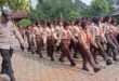 Tanamkan Bela Negara dan Kedisiplinan, Babinsa dan Babinkantibmas Latih PBB pada Anggota Pramuka SD Negeri 1 & 2 Piasa